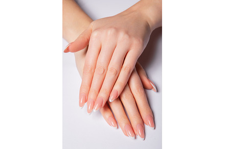 Hands with long nails with french, a Beauty & Fashion Photo by korabkova
