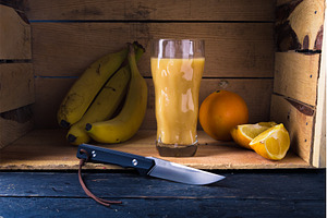 Still Life with Knife, Sliced Citrus, a Food & Drink Photo by Stockphoto by vzwer