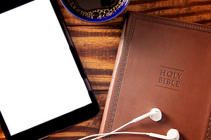 A Tablet with a Bible for LIve Streaming Church Services or Bibl