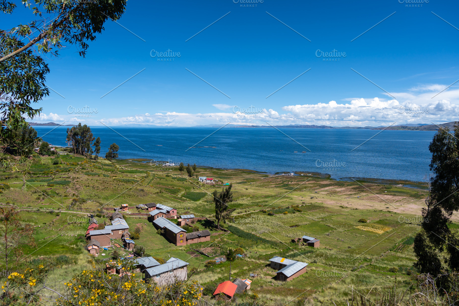 Scenic view of Lake Titicaca from Llachon with rural houses, a Nature Photo by GoodGoods
