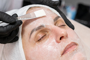 Cosmetician mask beauty care female face treatment, a Person Photo by Photo Drive Studio