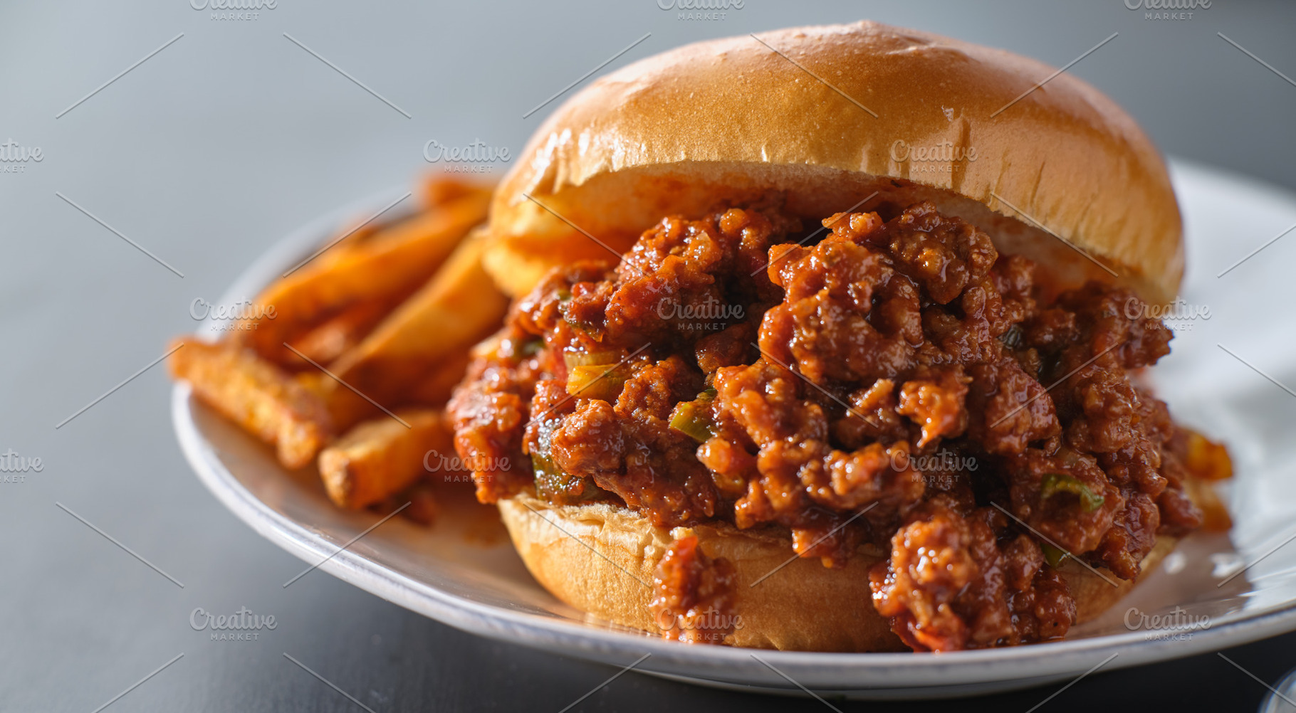 sloppy joe on plate with fries, a Food & Drink Photo by RezArt