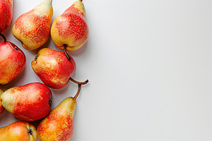 Red pears with copyspace for text on white background, a Food & Drink Photo by AlyaAnd