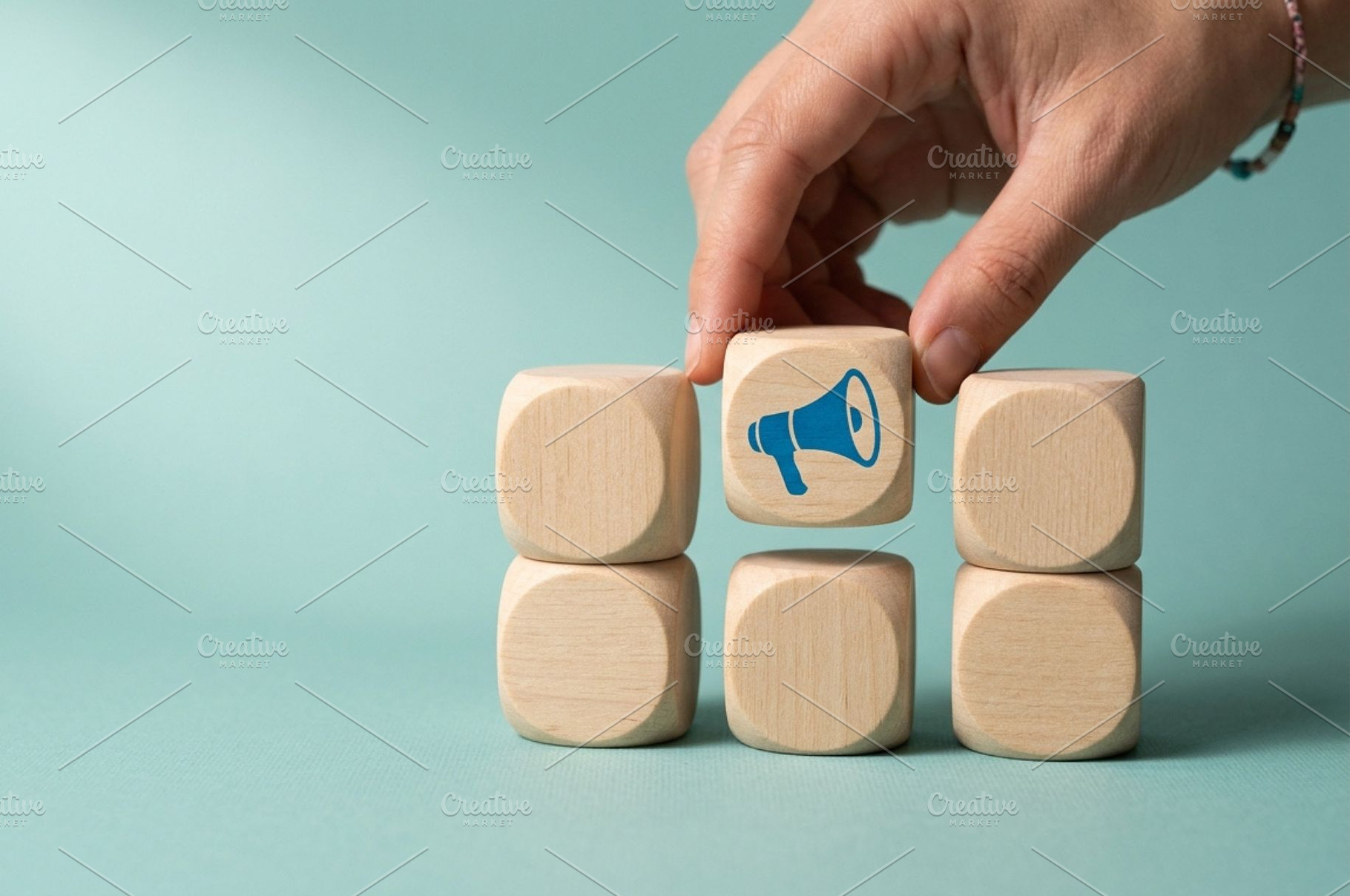 Wooden Block with Megaphone Icon, a Business Photo by thepslr