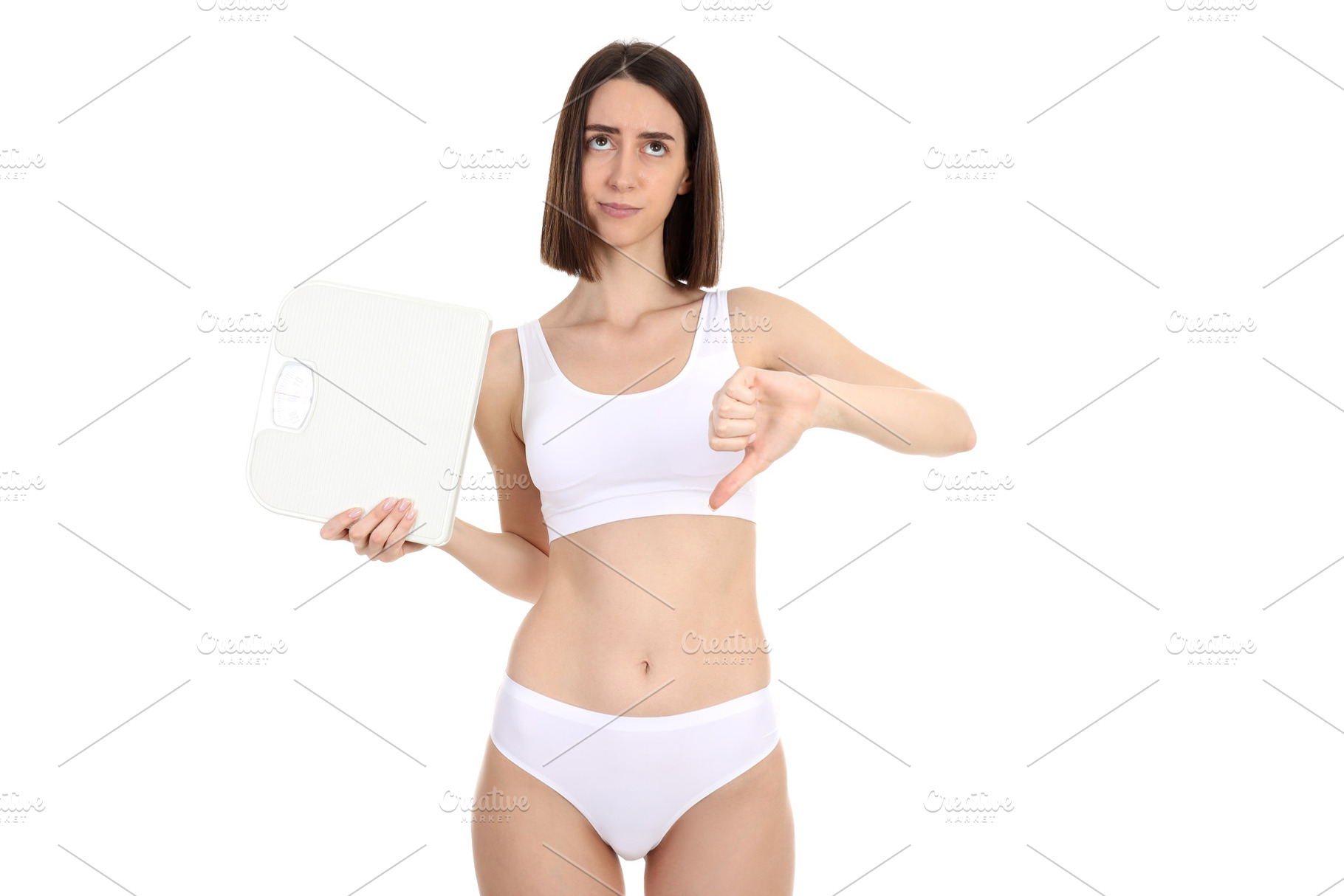 Concept of weight loss with young slim woman isolated on white b, a Person Photo by AtlasStudio