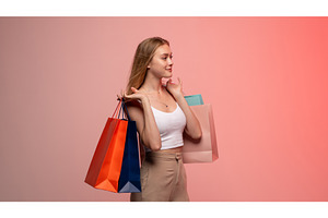 Young woman shopping, feeling happy, a Person Photo by volodymyrshtun13795