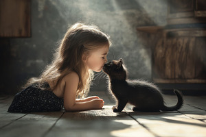Little girl enjoys affectionate mome, a Photo by Iftikhar Alam
