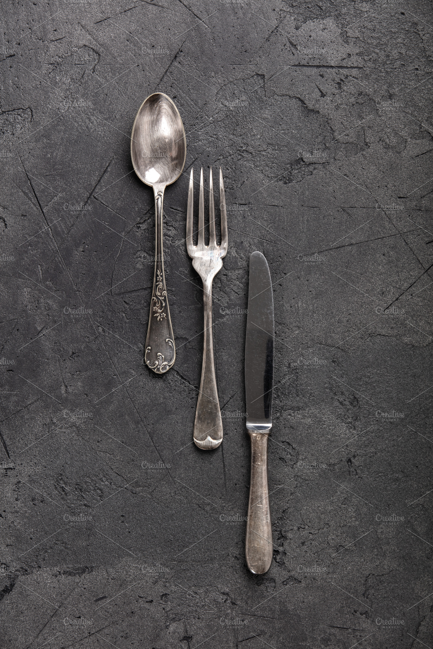 Vintage Silverware Collection on Dark Stone Background, a Food & Drink Photo by Natalia Klenova's Shop