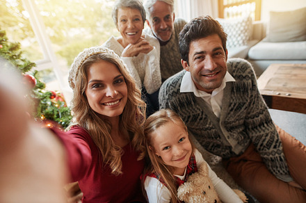 Happy extended family taking selfie, a Holiday Photo by Jacob Lund