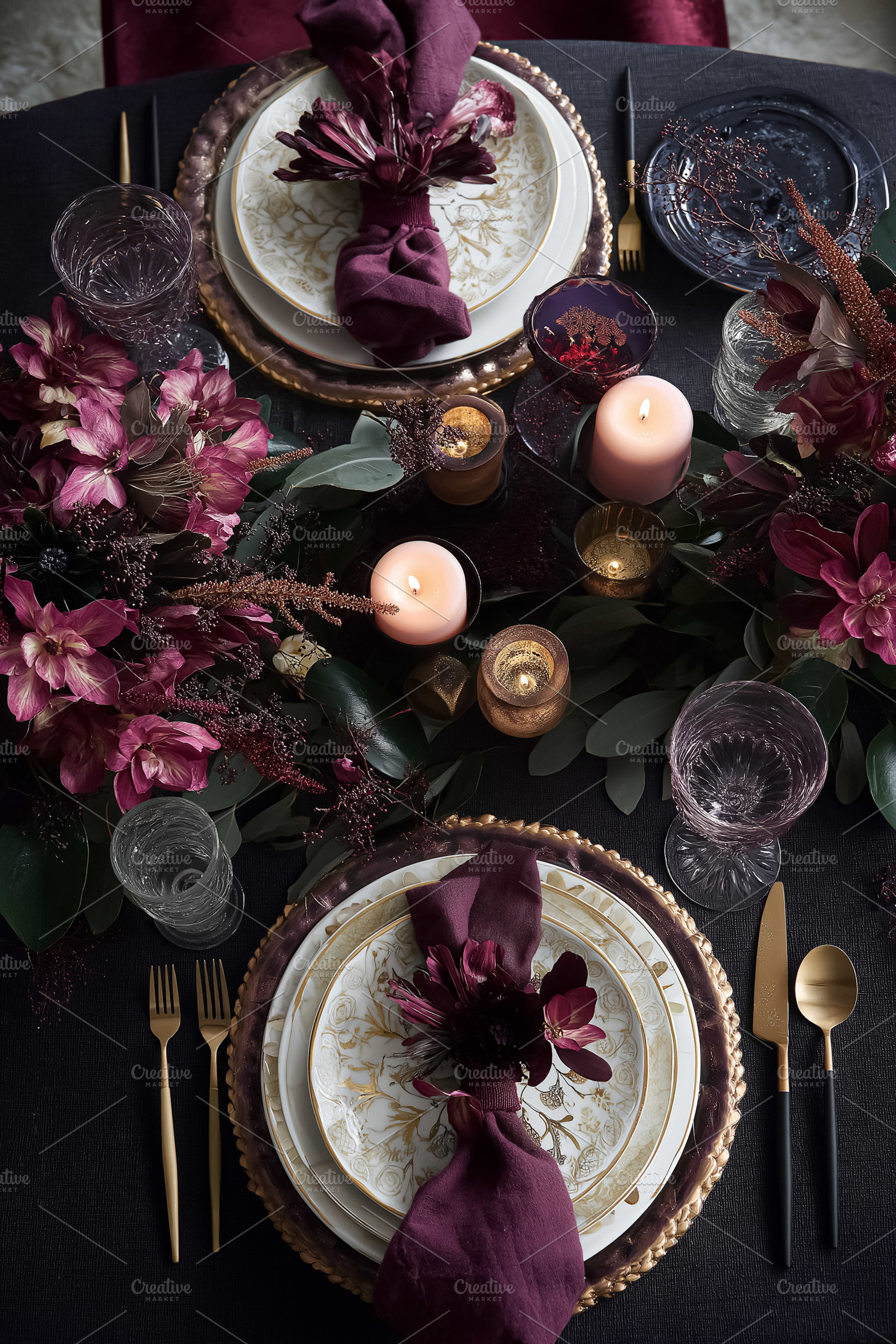 Dining table arrangement with decorative plates, napkins, flowers, and candleli, a Food & Drink Photo by Studio ANNA