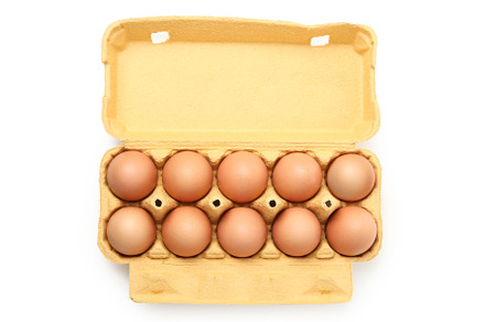 Egg box with eggs isolated on white background, a Food & Drink Photo by AtlasStudio PRO