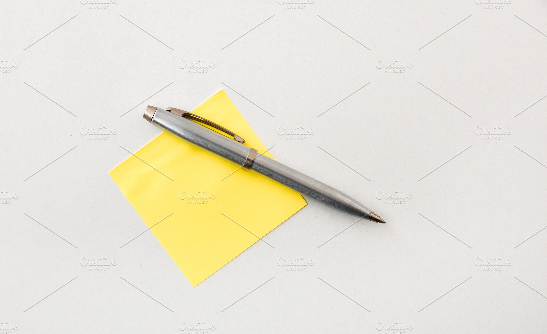 Silver Pen on Yellow Sticky Note, a Business Photo by Davizro's Market