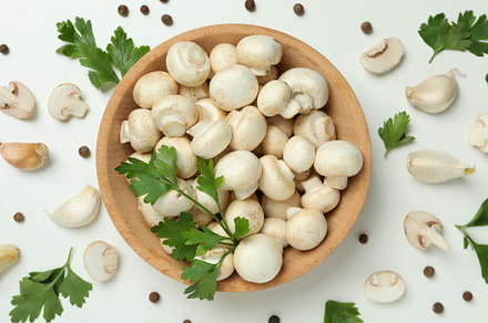 Concept of tasty food with champignon on white, a Food & Drink Photo by AtlasStudio PRO