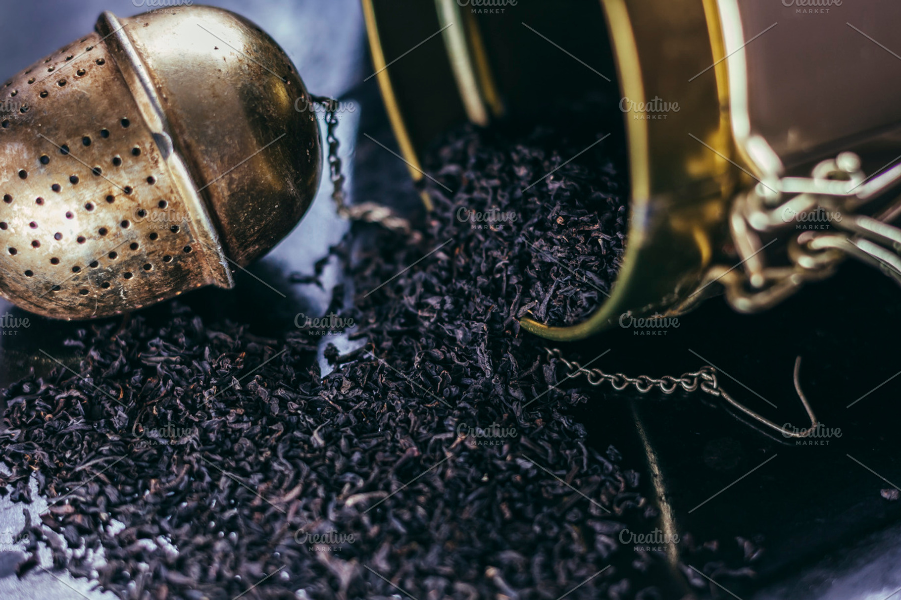 Black tea with tea infuser, a Food & Drink Photo by LidiaP