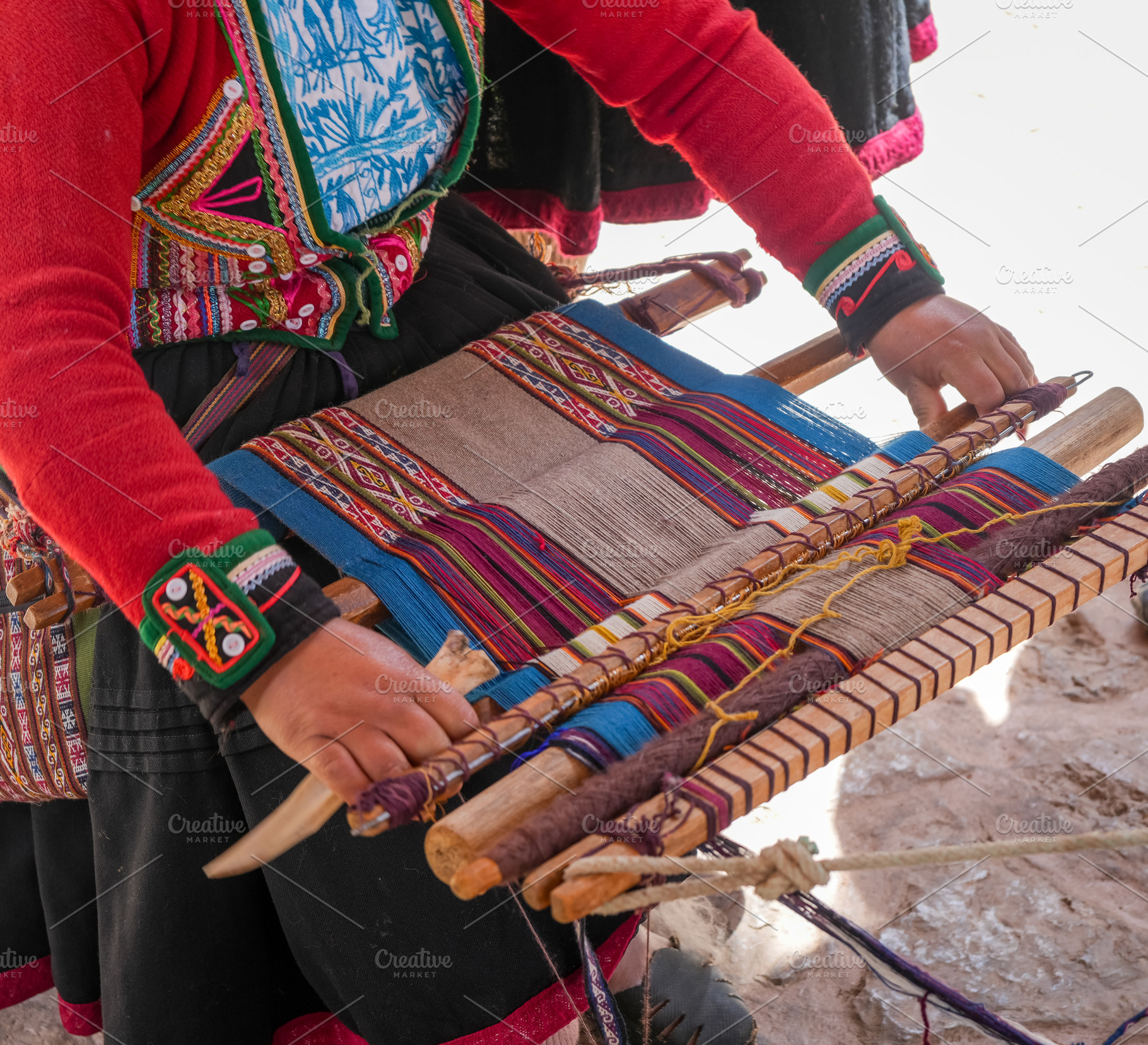 Andean artisan weaving a colorful textile near Cusco, Peru, a Photo by GoodGoods