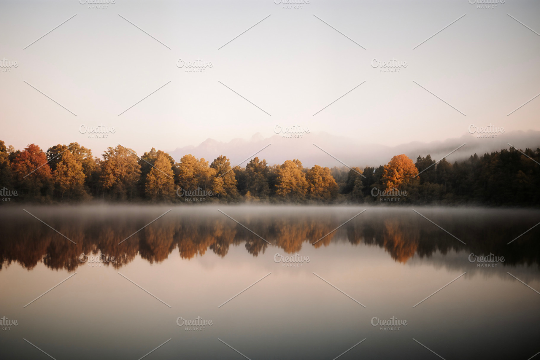 Calm lake sunrise in autumn, a Background Photo by rarrarorro