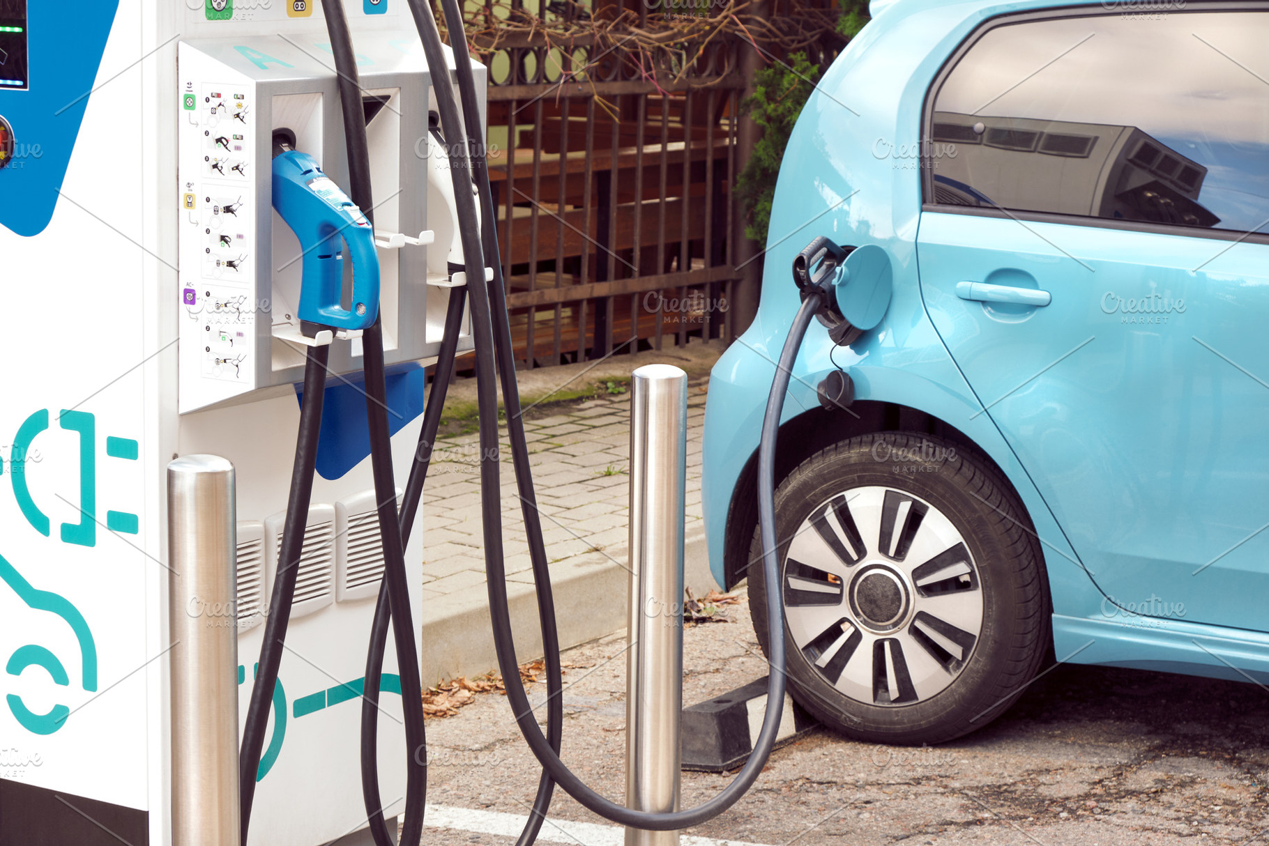 Electric car at charging station, a Transportation Photo by BOOCYS