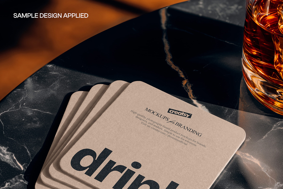Square Coasters on Table Mockup, a Cups & Container Mockup by creatsy5 (Photo 4 of 5)