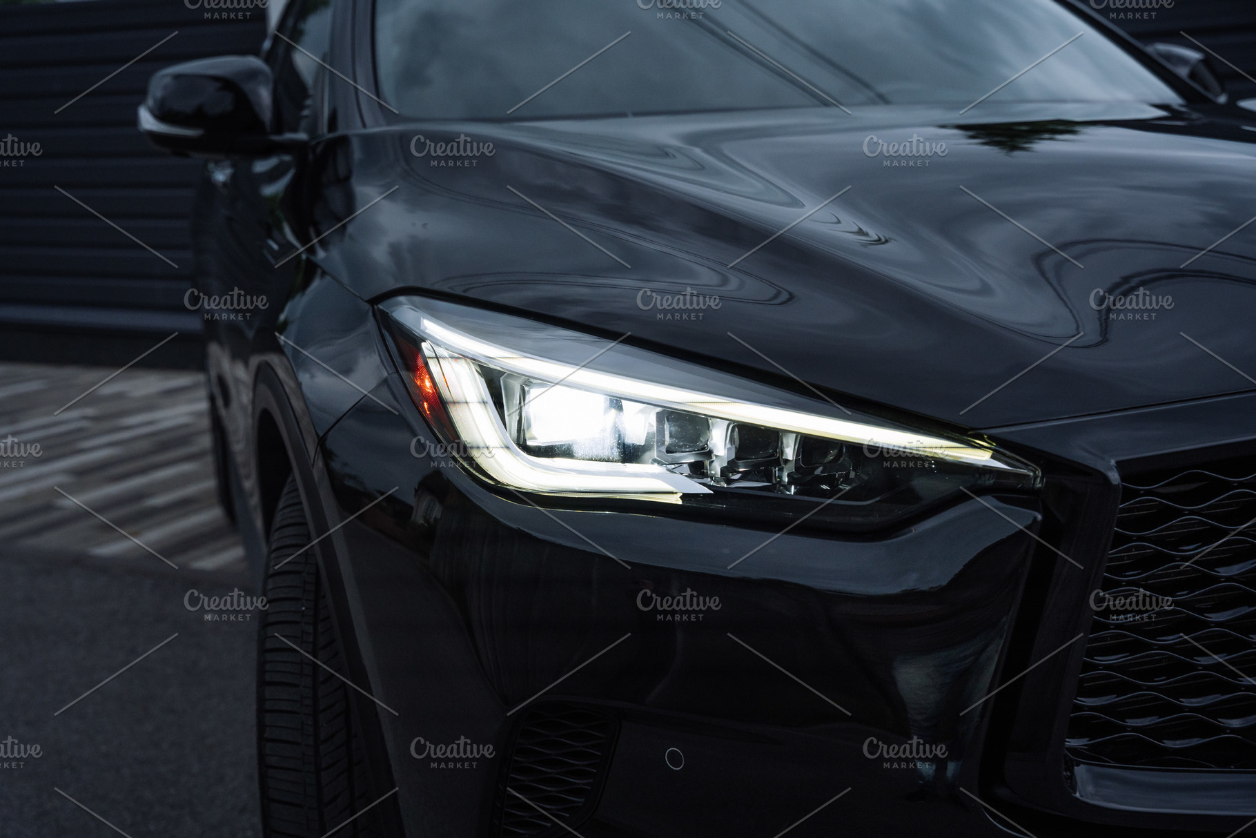 Modern Black Car Headlight Close Up at Night, a Transportation Photo by Red Hot Chili Pepper Shop