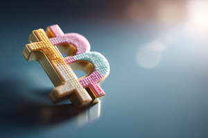 Colorful pastel bitcoin symbol on reflective surface with soft light representi, a Photo by AS photostudio
