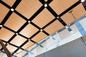 Modern architectural ceiling with wooden panels and glass balust, a Photo by AS photostudio