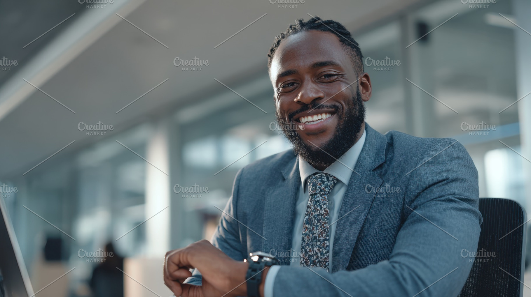 A man sits at a desk in an office, a Photo by Beautiful things