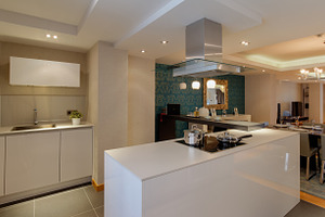 Kitchen interior stock photo containing beige and cabinet