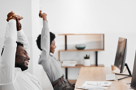 Stretching, call center and customer service people with computer in contact us support and crm consulting office. Happy smile, man or motivation black woman ready to help telemarketing communication, a Photo by Peopleimages.com