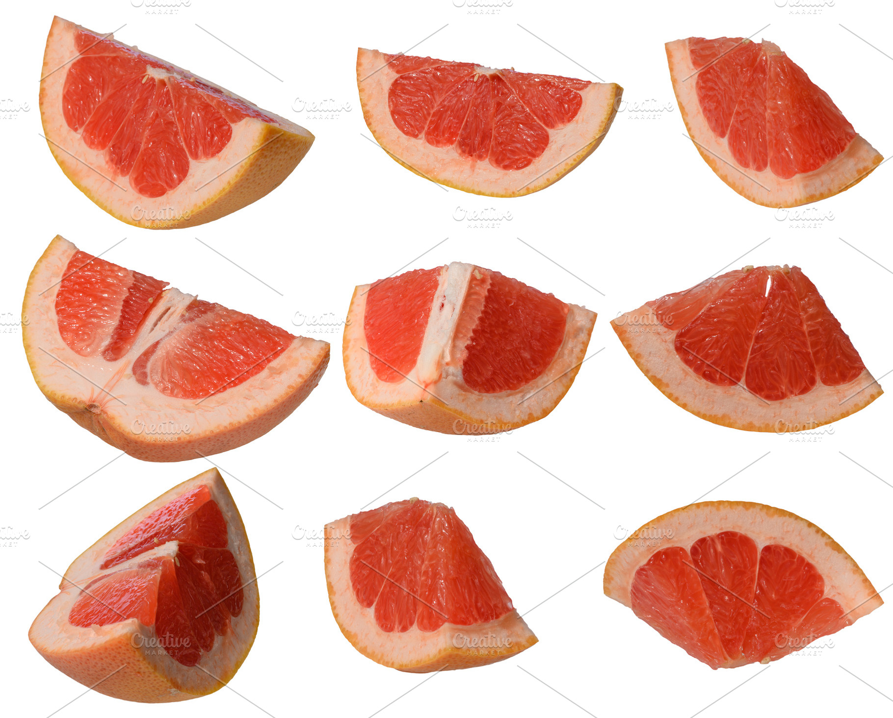 Several sliced red grapefruit wedges, arranged on isolated, a Food & Drink Photo by ndanko