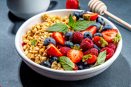 Healthy breakfast granola with berry, a Food & Drink Photo by Rimma