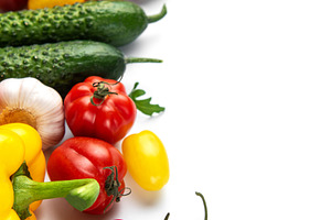 Fresh organic vegetables creating healthy vibrant food border, a Food & Drink Photo by Olena Rudo