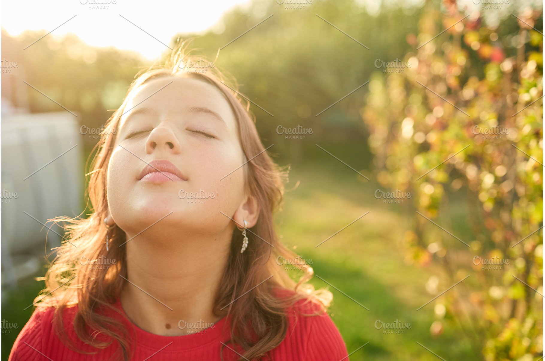 Girl enjoys the warmth of sunlight, a Nature Photo by IlliaBondarPhotography