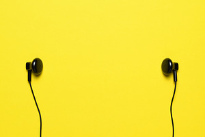 Headphones on yellow background