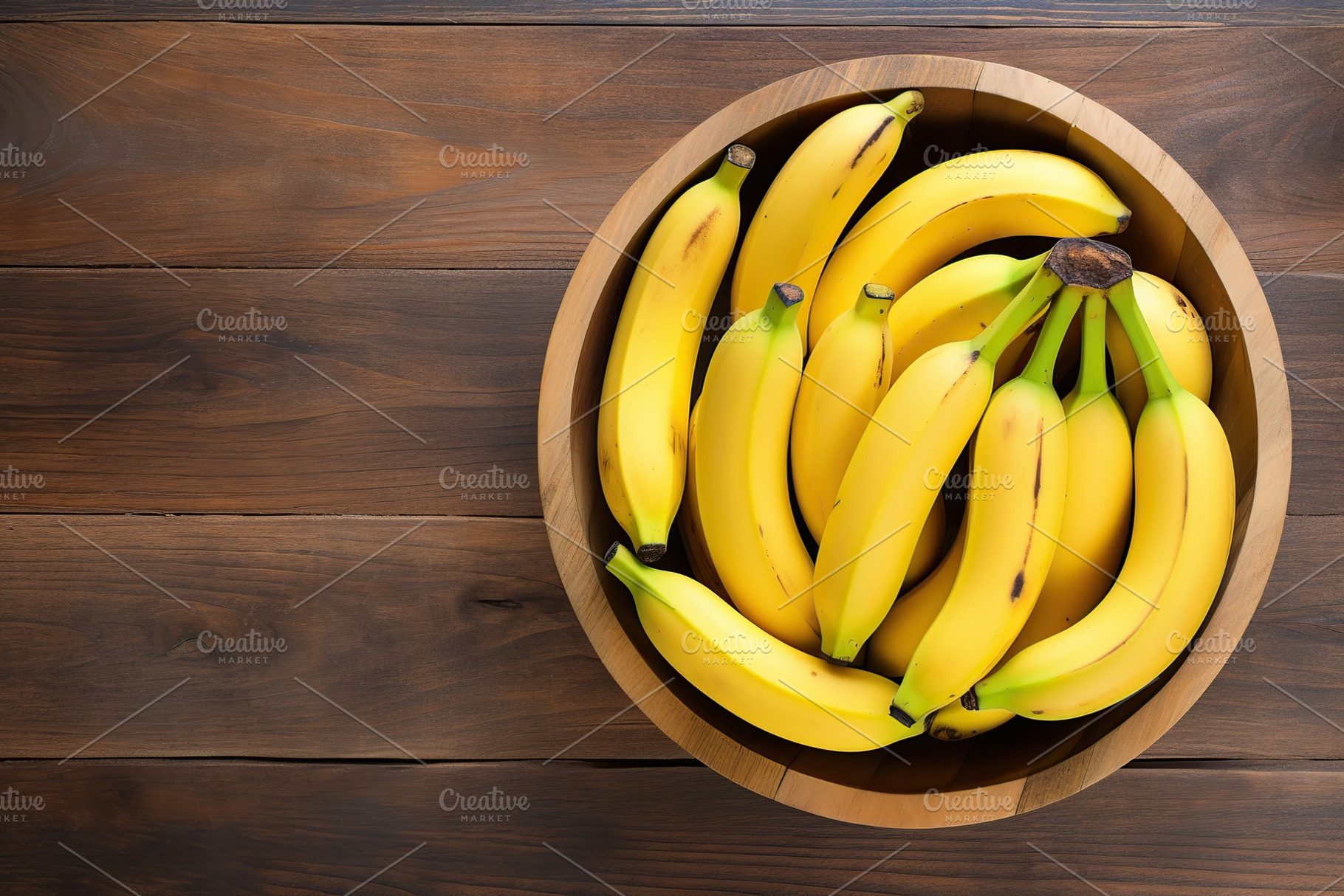 Ripe bananas in bowl on brown wooden background, a Food & Drink Photo by AlyaAnd