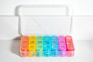 Weekly Pill Box With Vitamins, a Health & Medical Photo by MAnuta