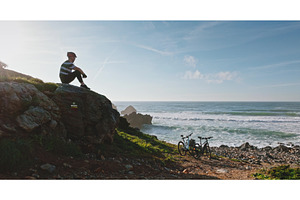Man resting with mountain bike by, a Nature Photo by Goinyk