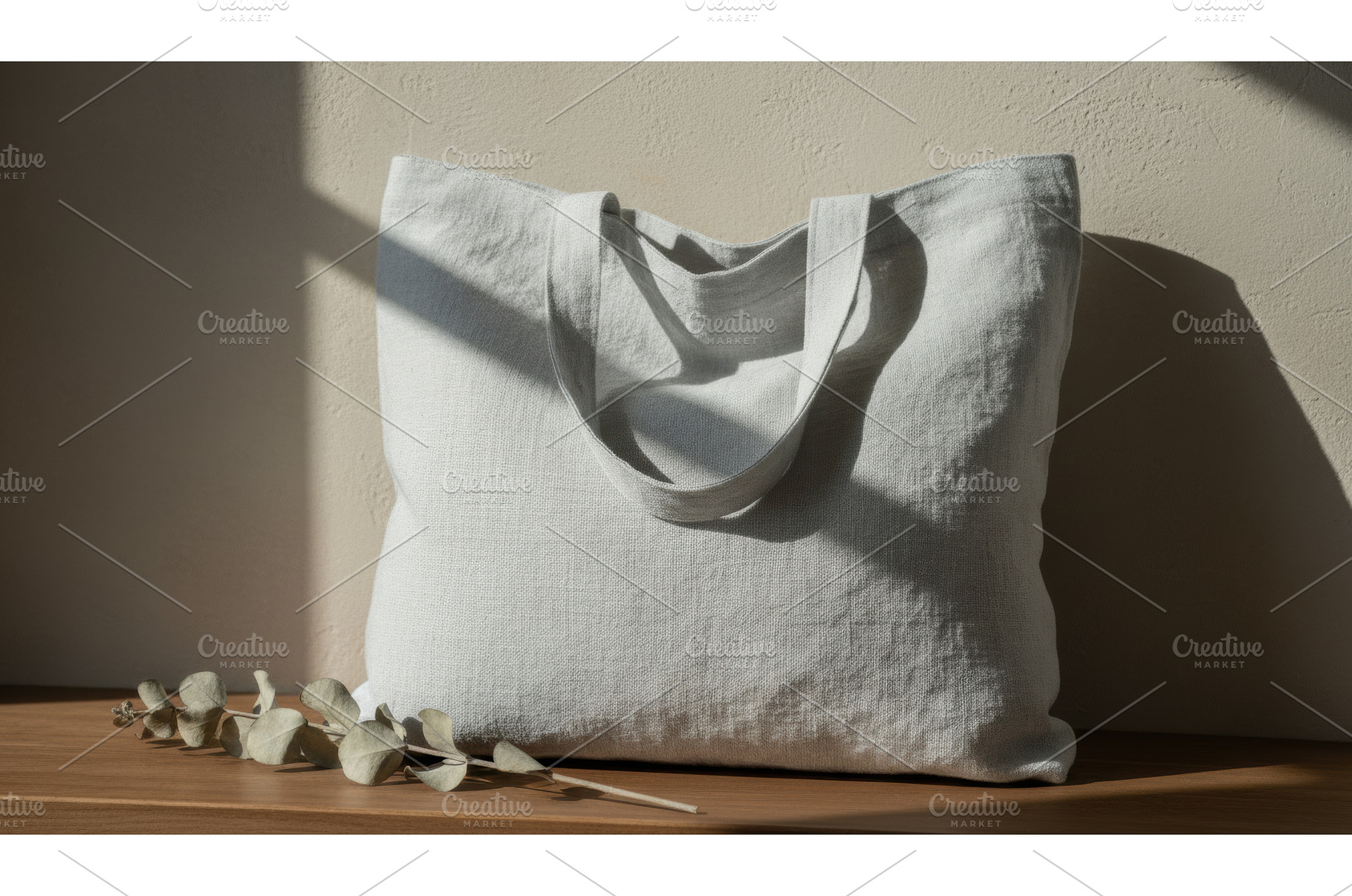 A softly lit fabric tote bag resting, a Beauty & Fashion Photo by Igor Tichonow