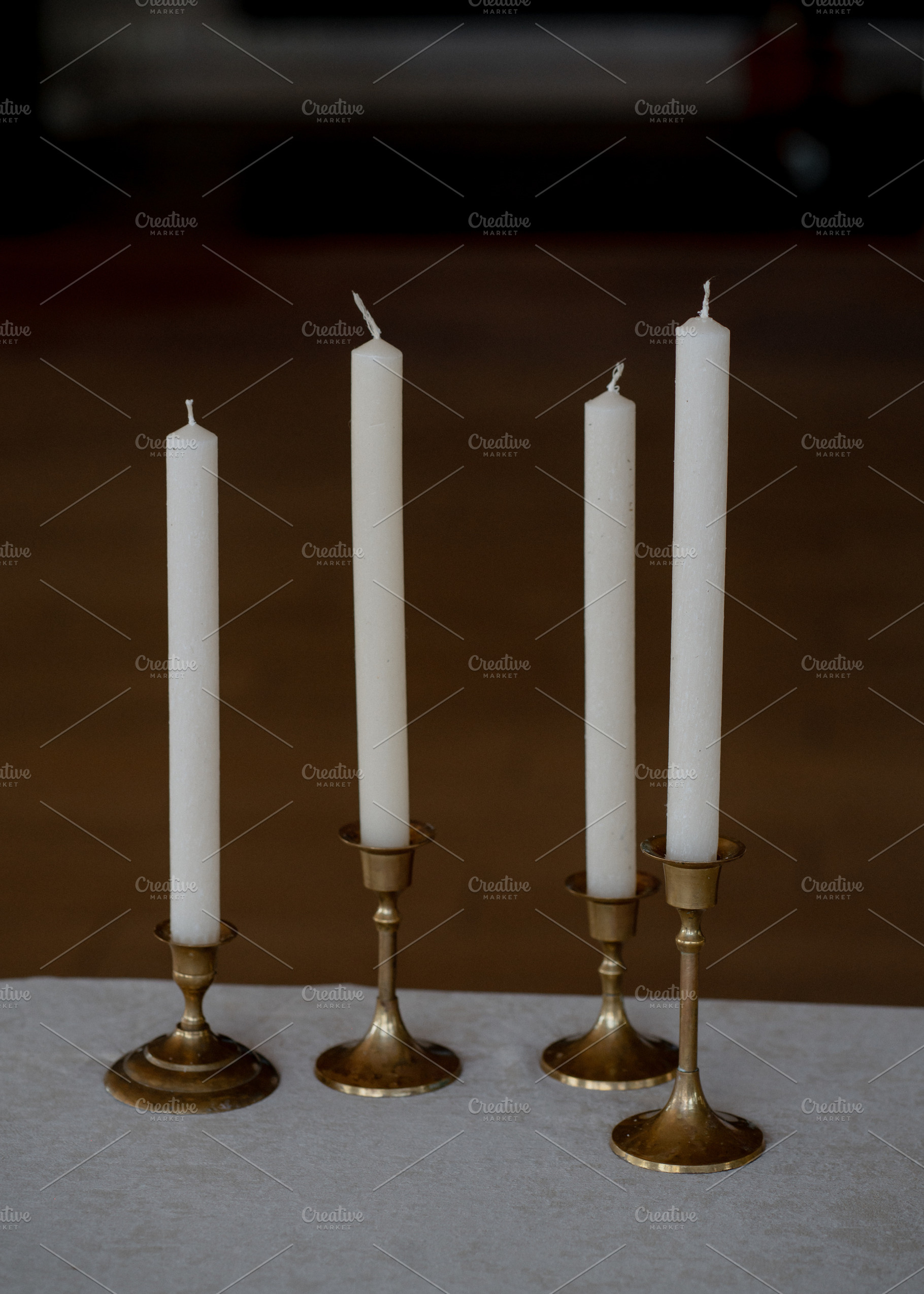 Candles on the table, an Abstract Photo by kostanashvili