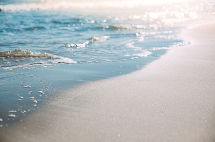 Summer sand beach and seashore waves background, a Nature Photo by Dvoevnore photos
