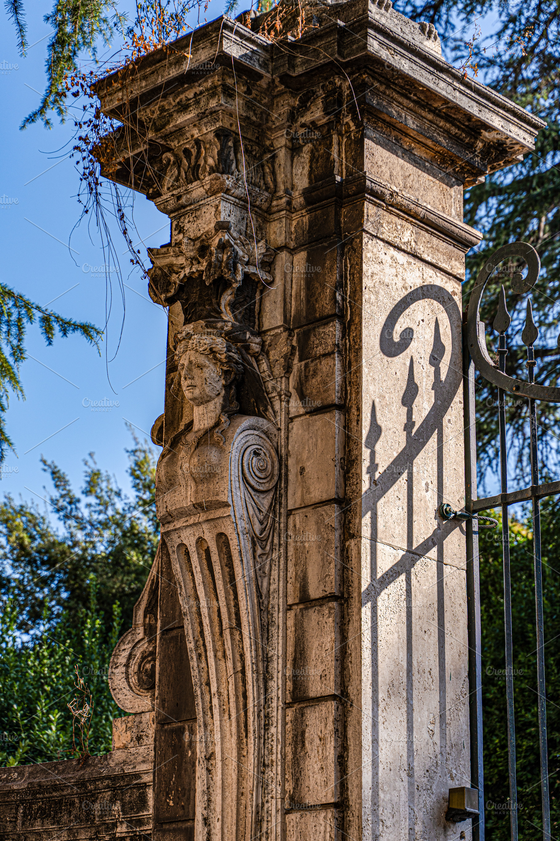 Sunlight and shadows on the ancient gate in the heart of Rome, I, an Architecture Photo by Anna Bogush
