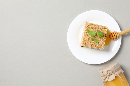 Concept of sweets, honey cake, space for text, a Food & Drink Photo by AtlasStudio