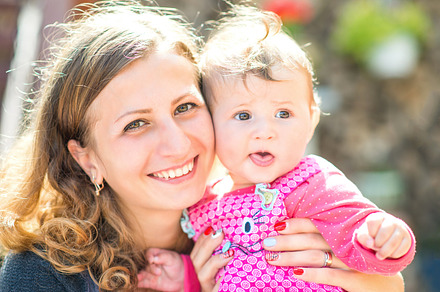 Beautiful mother and baby outdoors stock photo containing happy and playing, a Person Photo by okskukuruza