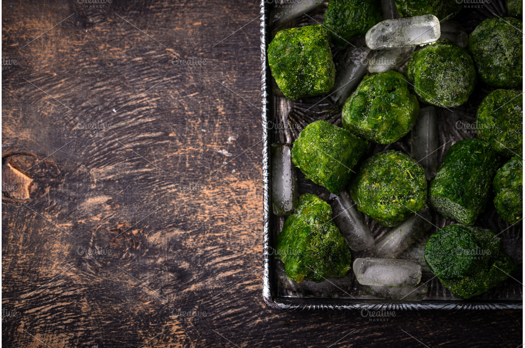 Frozen spinach green cubes in bowl, a Food & Drink Photo by Yulia Furman