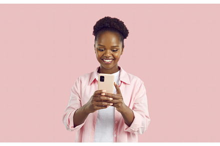 A happy African-American woman talks, a Person Photo by StudioRomantic