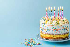 Birthday cake with glowing candles, a Photo by Pavel_design