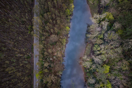 Aerial view of the Navia river and a road in Coaña, Asturias Spain, a Nature Photo by CreativePhotoSpain