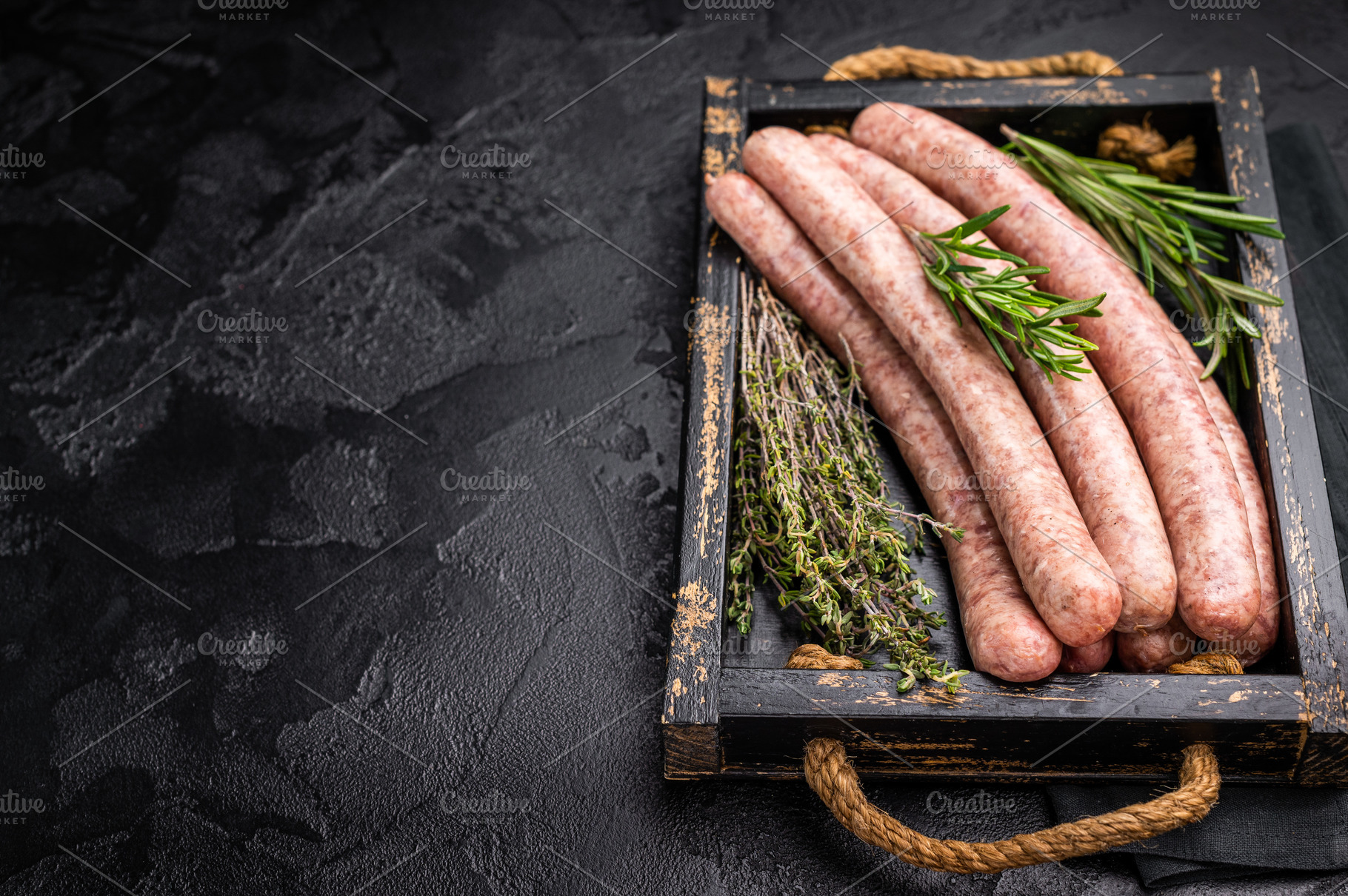 Raw sausage packed with herbs and spices, inviting you to create, a Food & Drink Photo by composter-box@mail.ru