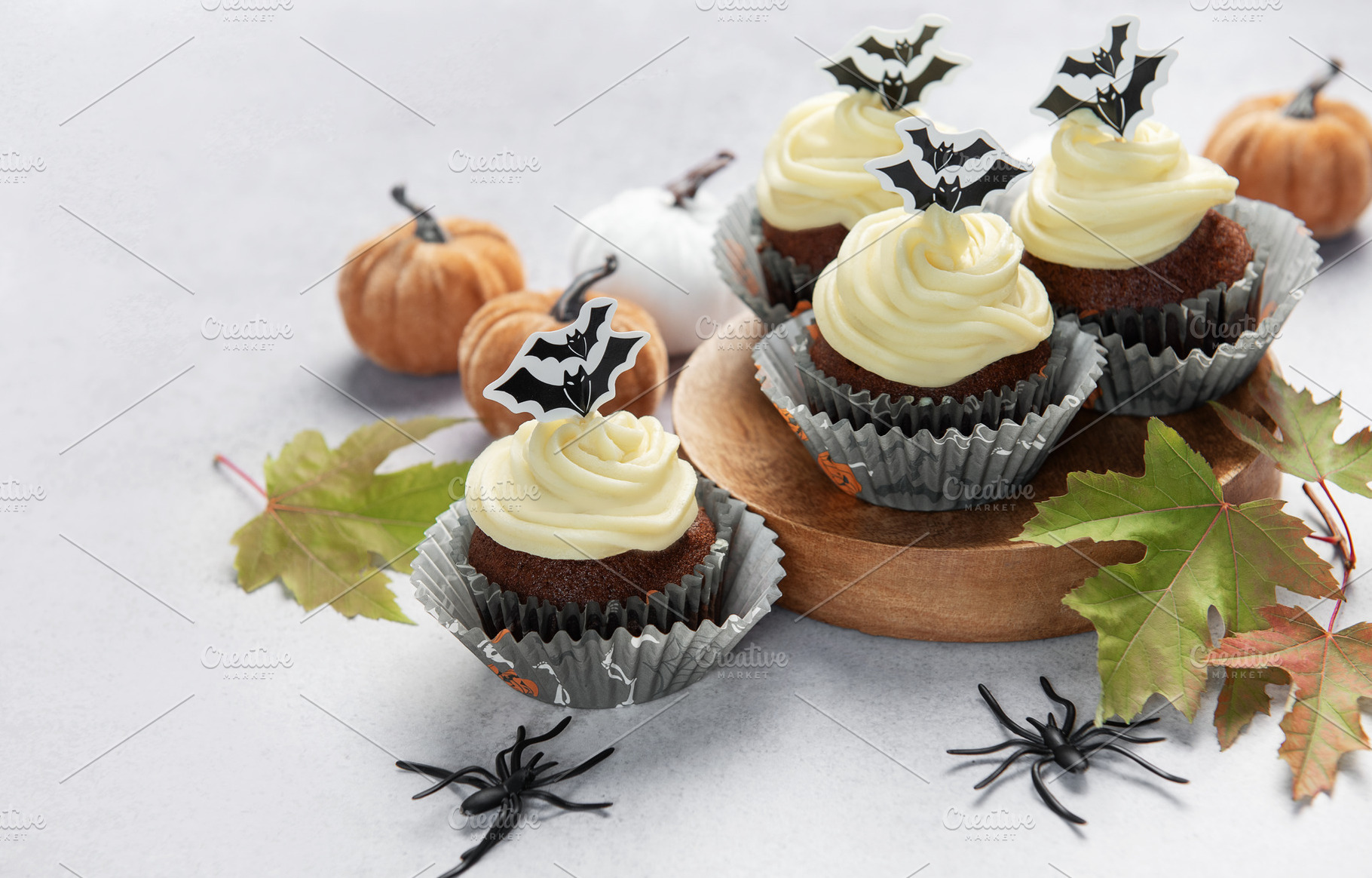 Halloween cupcakes with bats, pumpkins, and autumn leaves, a Food & Drink Photo by Olena Rudo