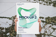 Man Holding Poster 2 Mock-up, a Print Template by Branda Keeps (Thumbnail 7 of 16)