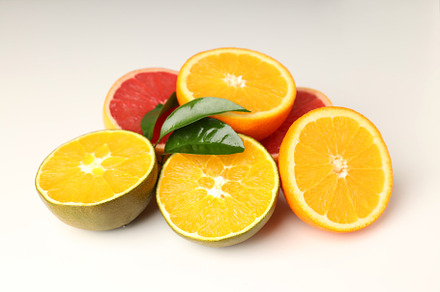 Concept of tasty food with citrus fruits on white background, a Food & Drink Photo by AtlasStudio PRO